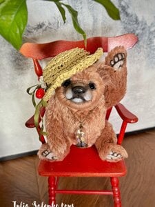 Bear in a straw hat